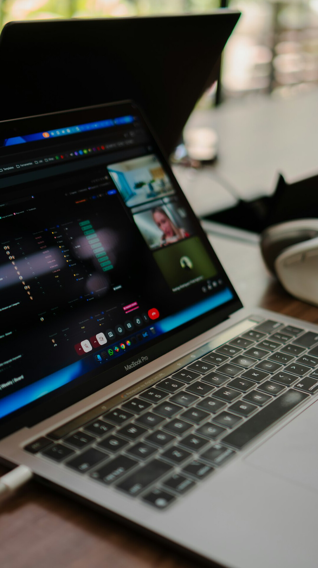 video editor working on laptop