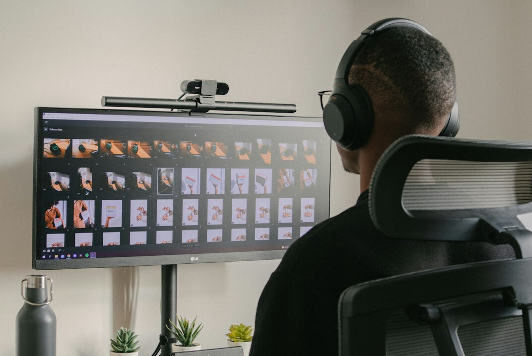professional video editor at desk